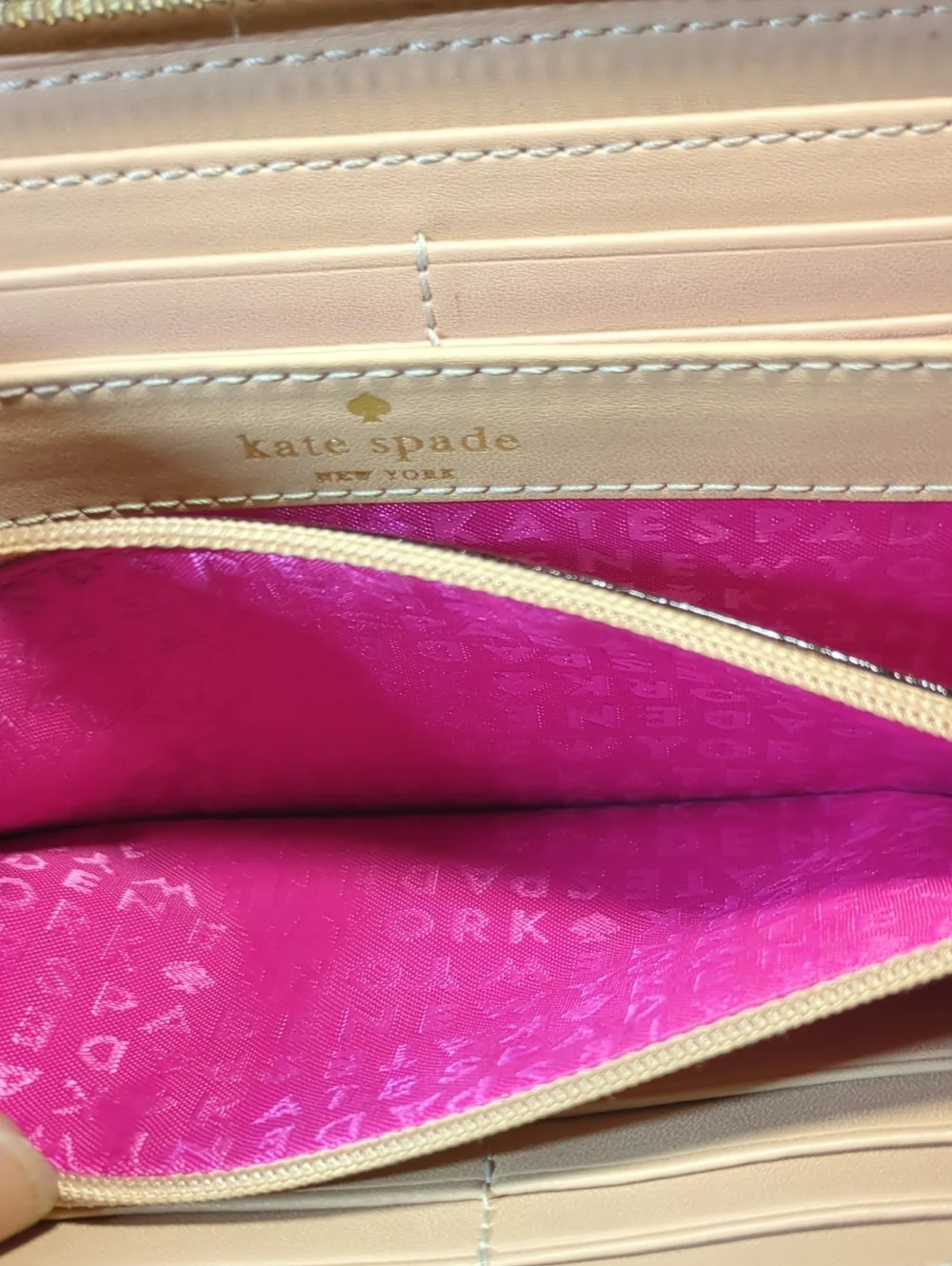 kate spade cream pebble leather zip-around wallet NOW ONLY $55